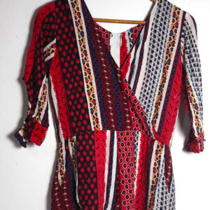 Macacão estampa vermelha