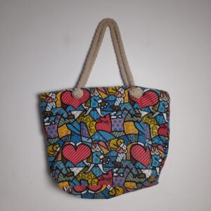 Bolsa estampada estilo Romero Brito com alça de corda