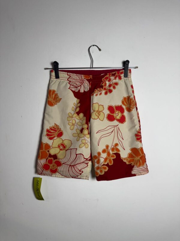Bermuda com dois lados estampado e vermelho - tam 7 / 8