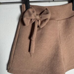 Short Infantil Nude com Laço Texturizado – tam 2